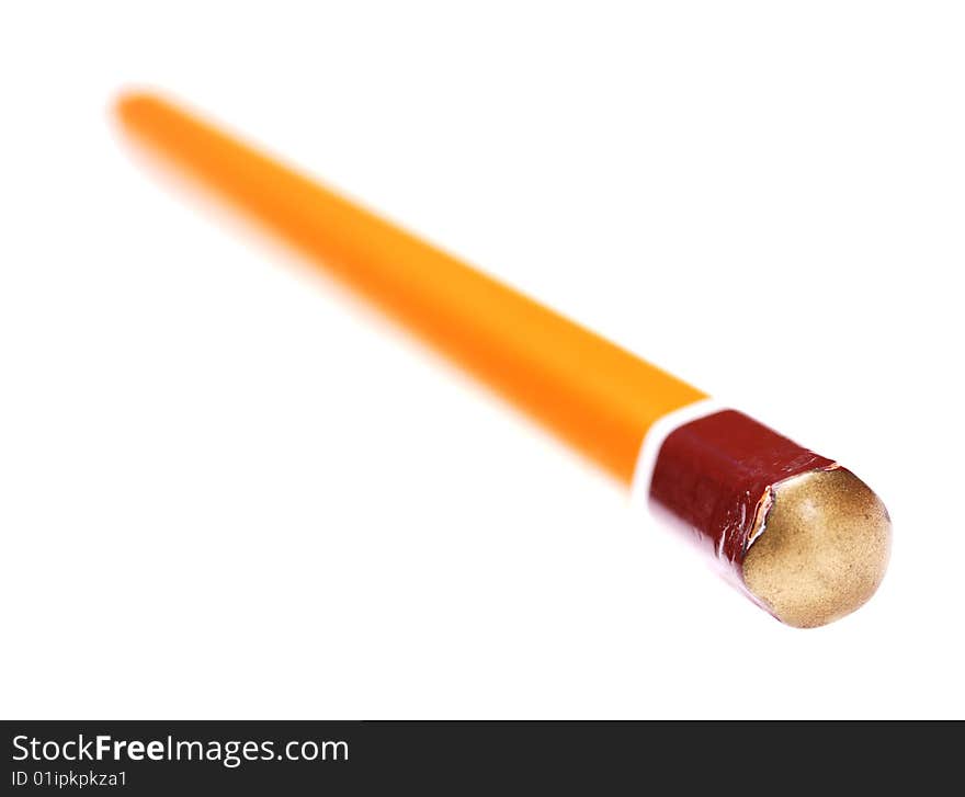 Orange pencil isolated on the white background. Narrow depth of field. Orange pencil isolated on the white background. Narrow depth of field.