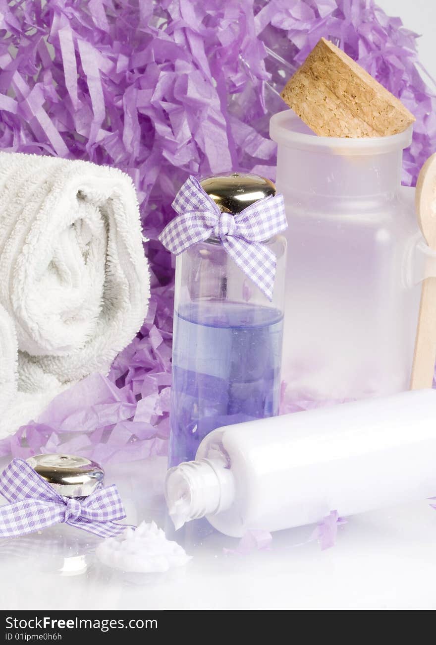 Spa essentials, cream and towel