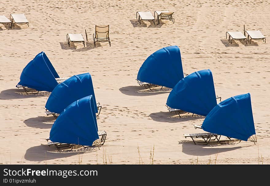 Blue Sun Umbrellas On Beach