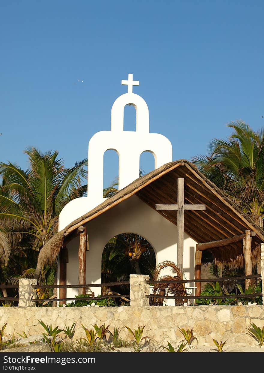 This chapel on a mexican resort opens toward the ocean is sheltered from rain. This chapel on a mexican resort opens toward the ocean is sheltered from rain.