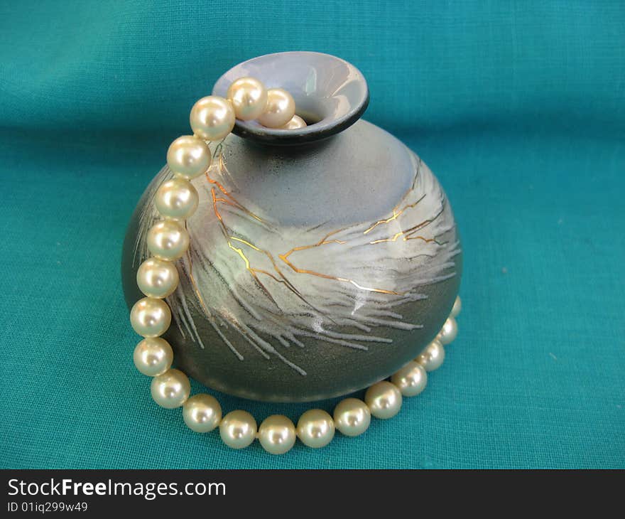 Vase and pearl bead