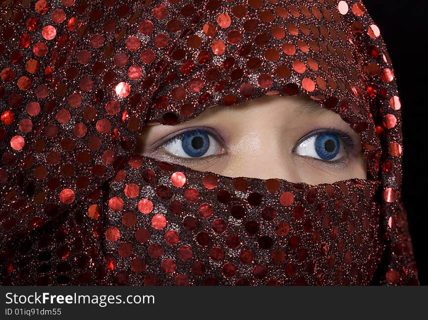 Blue eyes Orient, macro photo of eyes with blue contact lenses