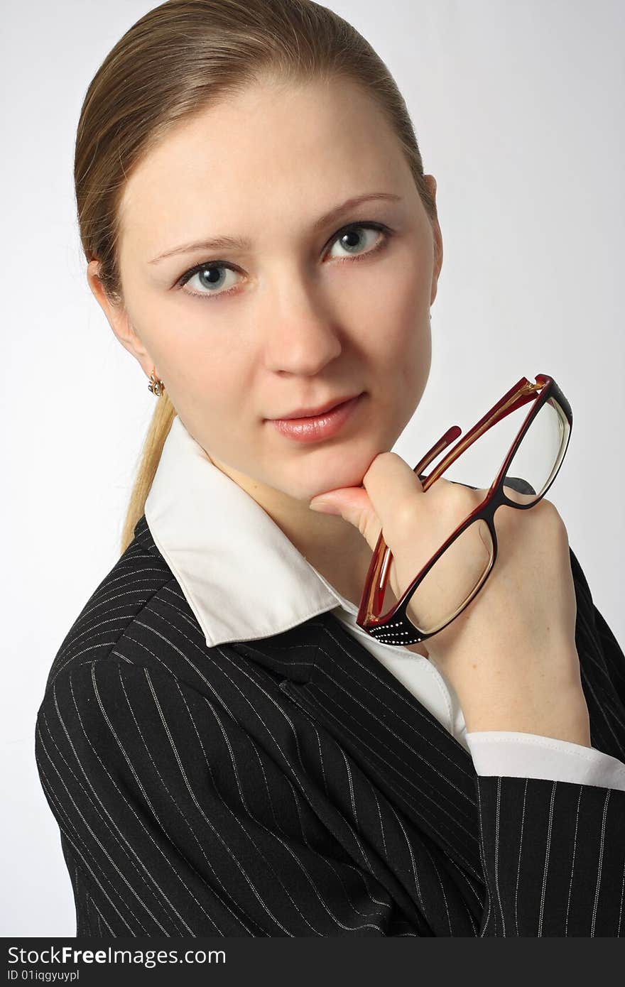 Young beautiful businesswoman with glasses