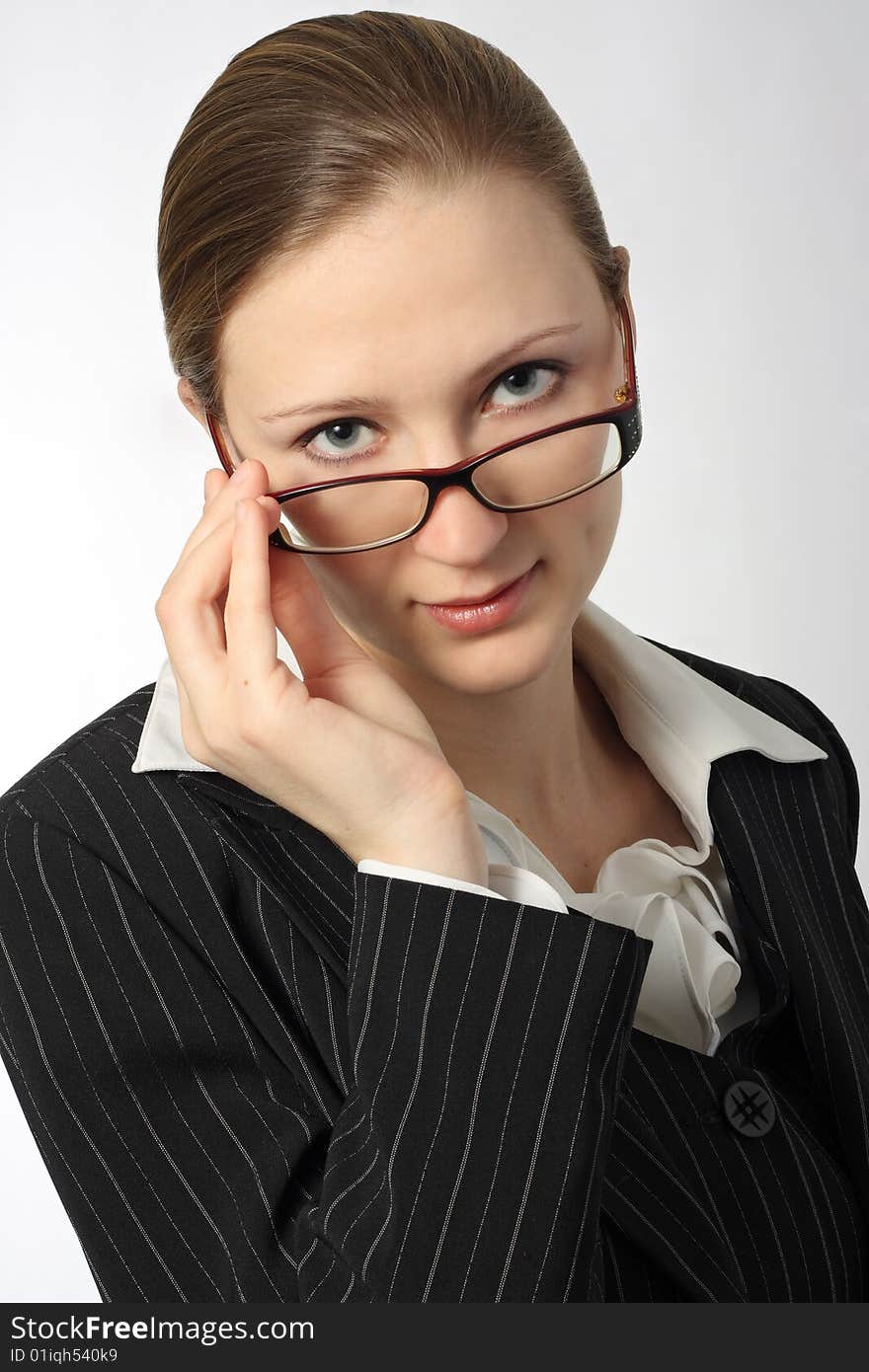 Young beautiful businesswoman with glasses