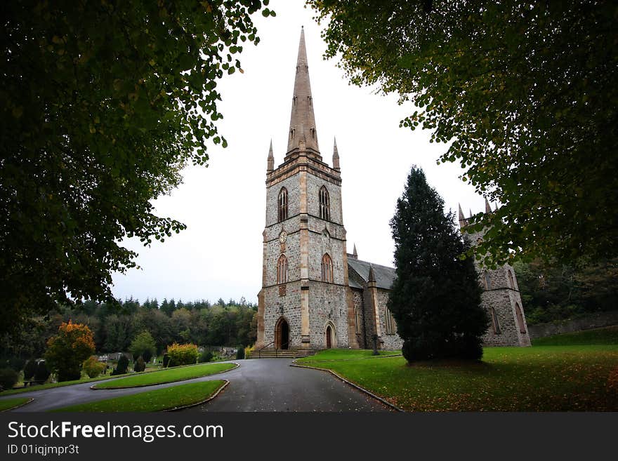 Church view from under some trees after a heavy shower of rain. Church view from under some trees after a heavy shower of rain