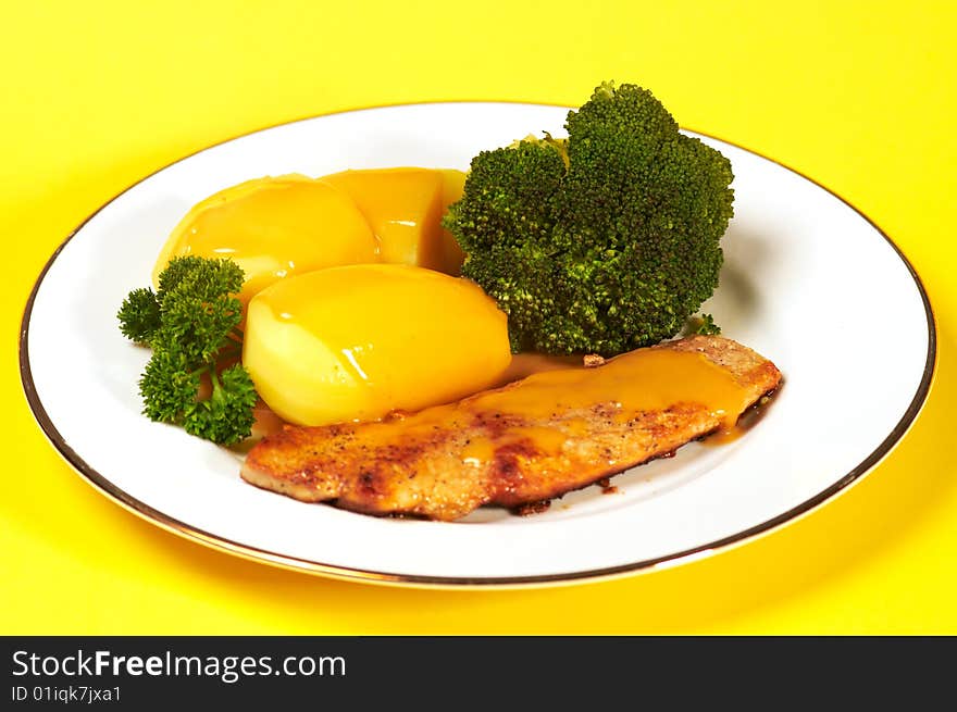 Cutlet with broccoli and potatoes