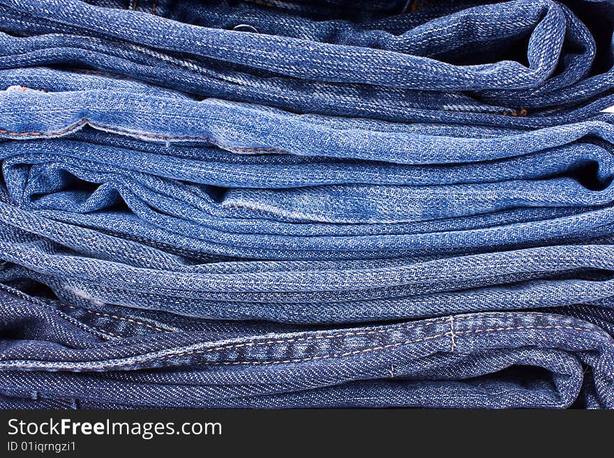 Stack of Blue Jeans Background