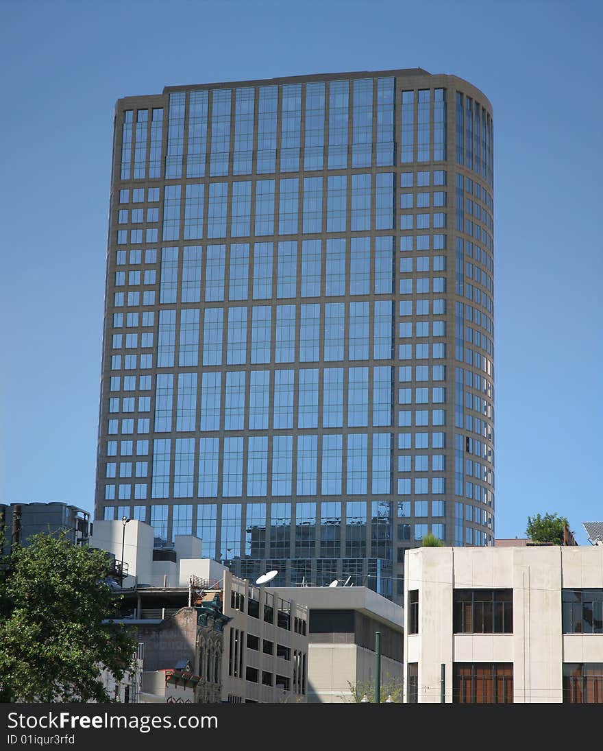 Big Square Building (Panorama) against blue sky