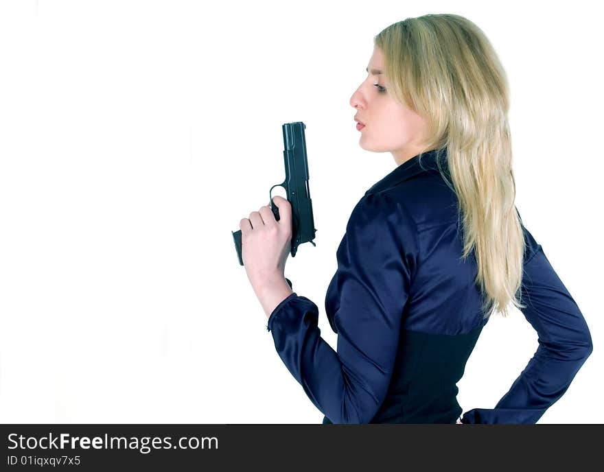 Young girl with gun isolated on white