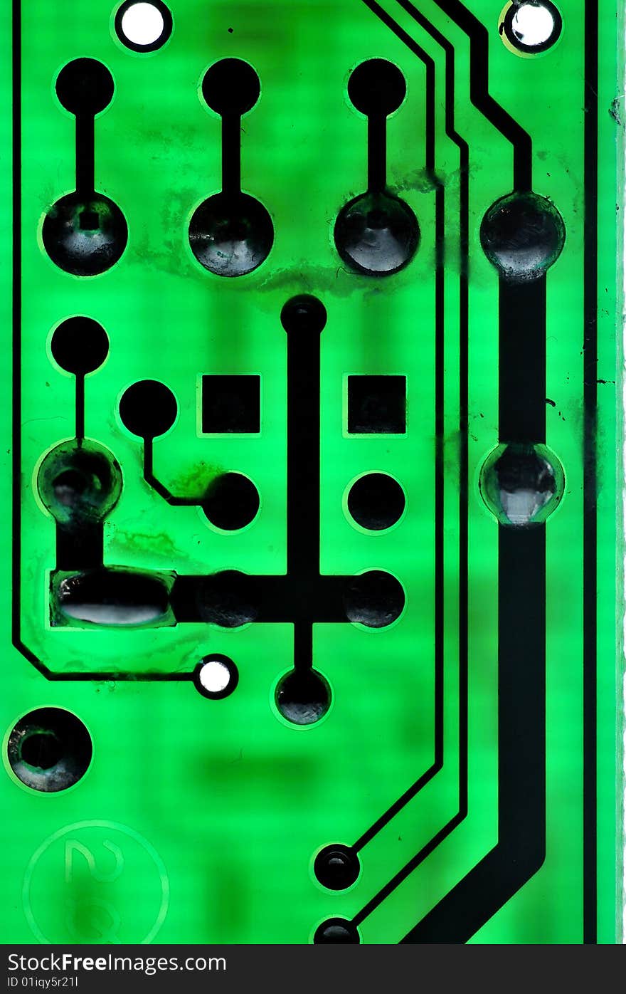 Close-up of green electronic printed circuit board