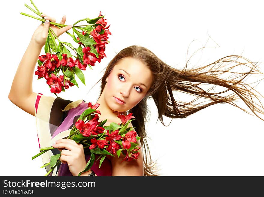 Attractive young woman with flowers, wind in hair, isolated on white. Attractive young woman with flowers, wind in hair, isolated on white