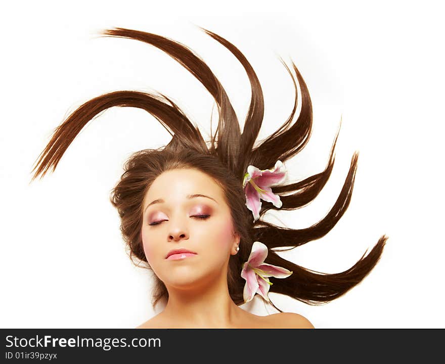 Beautiful woman with flowers in hair