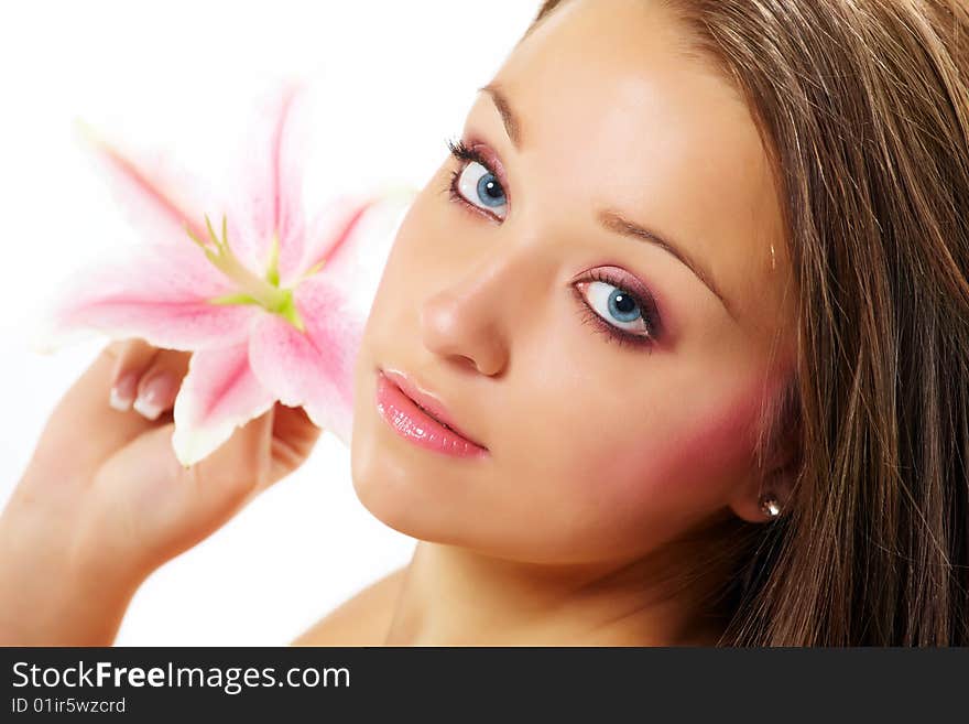 Beautiful young woman with lily flower. Beautiful young woman with lily flower