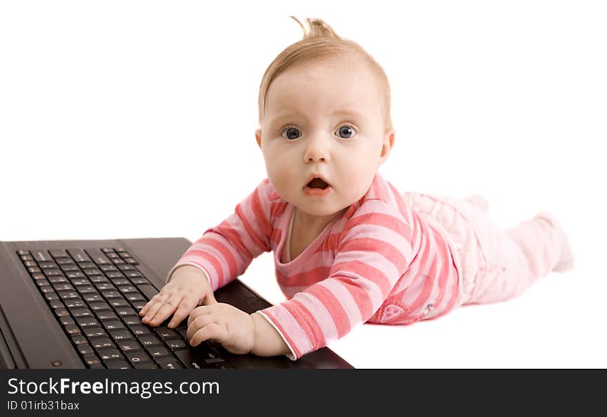 Little baby with laptop on white