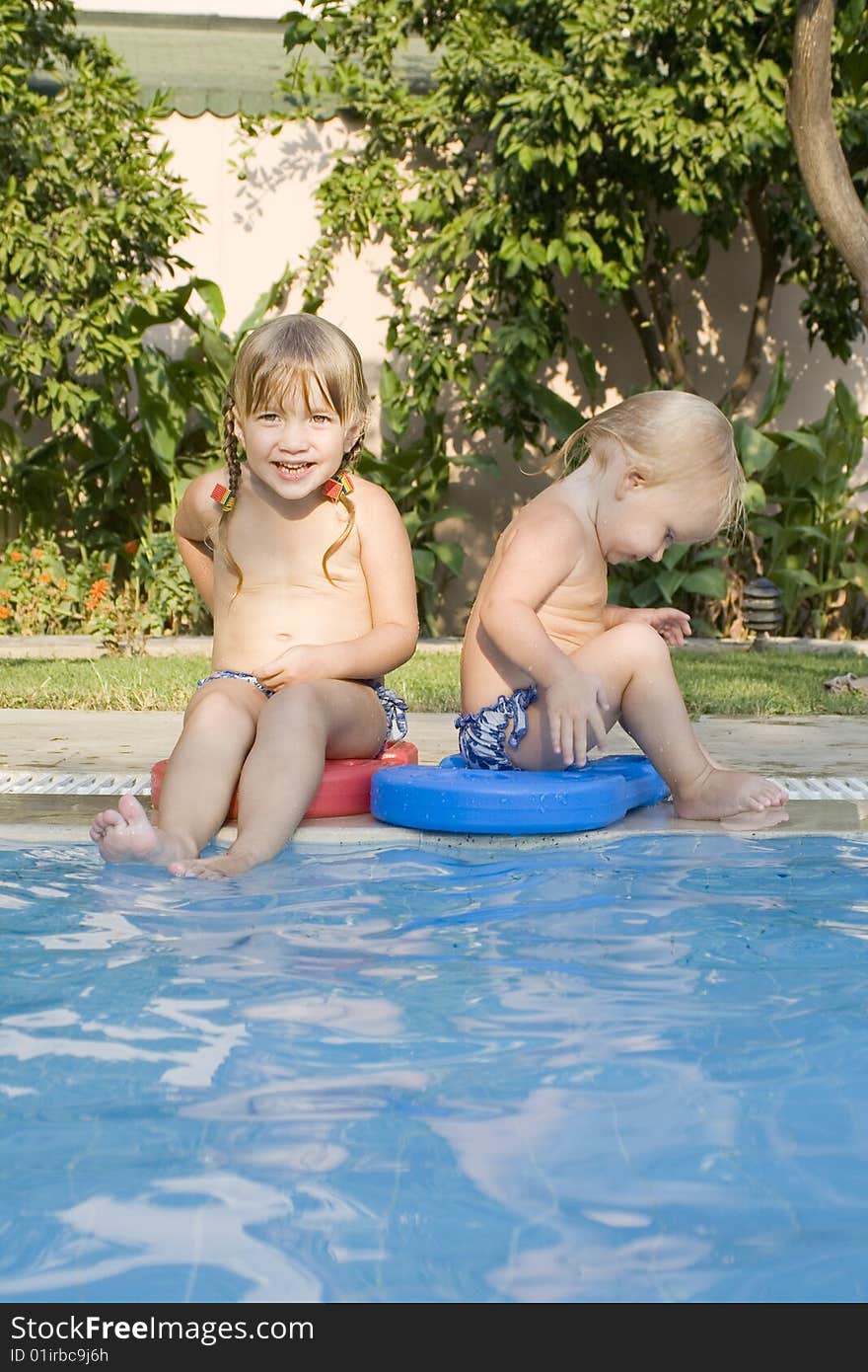 Two children in a pool