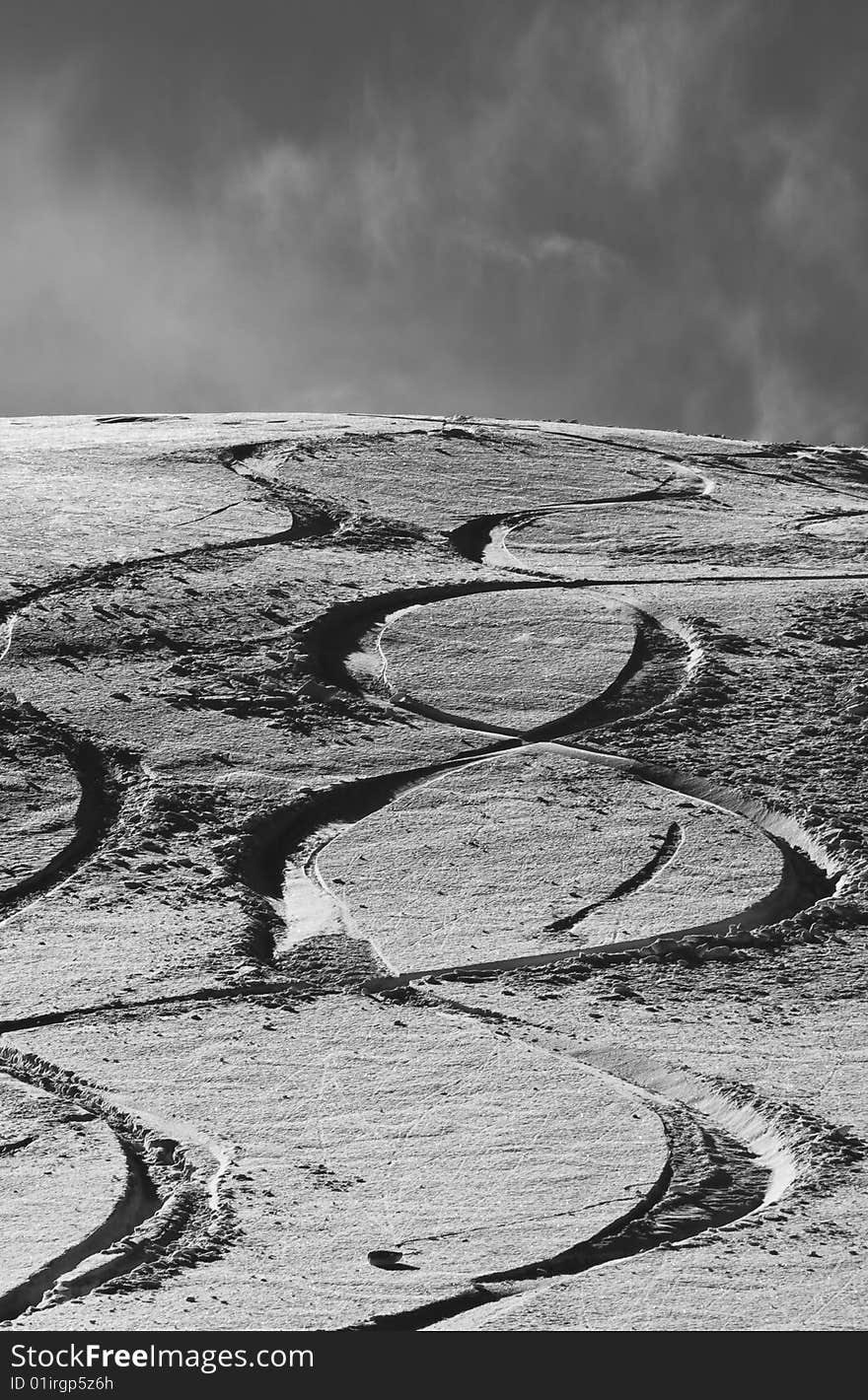 Freshly made ski tracks in powder