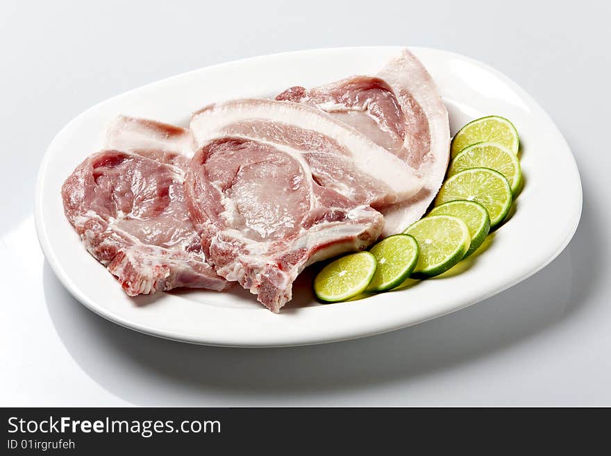 Raw pork meat cut known as Pork Steak or loin chop