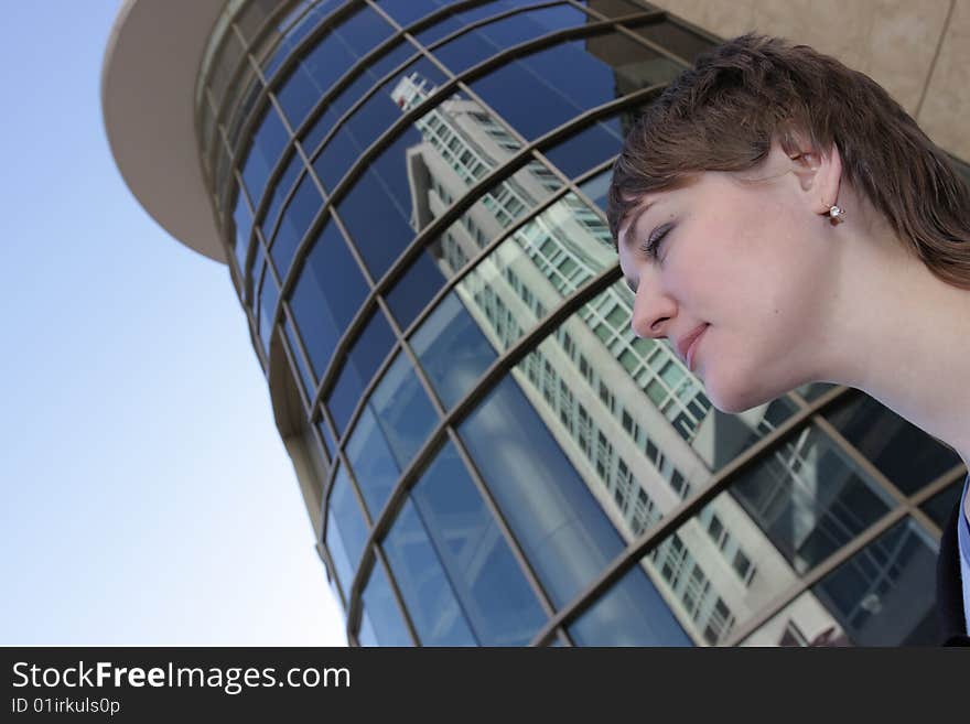 Portrait of a woman on a skyscraper background. Portrait of a woman on a skyscraper background