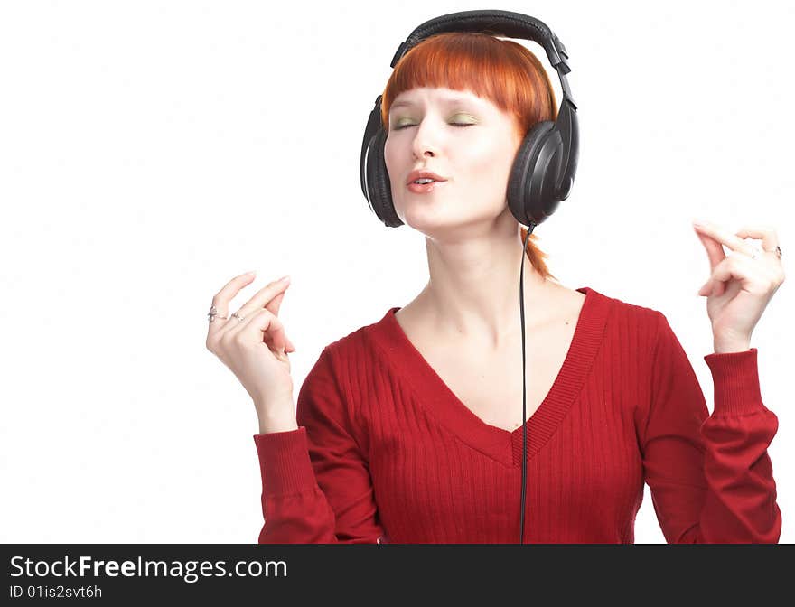 Beauty girl in head phones on white background