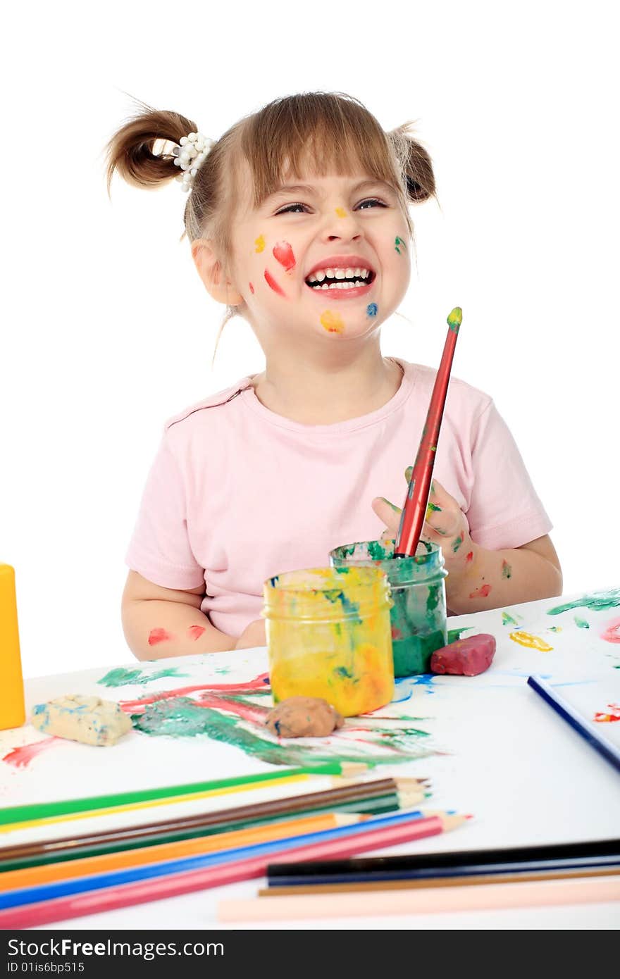 Beautiful child enjoying his game. Shot in a studio. Beautiful child enjoying his game. Shot in a studio.