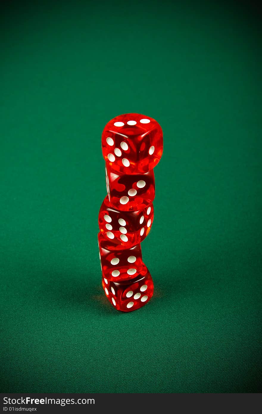 Tower of red dice on casino table
