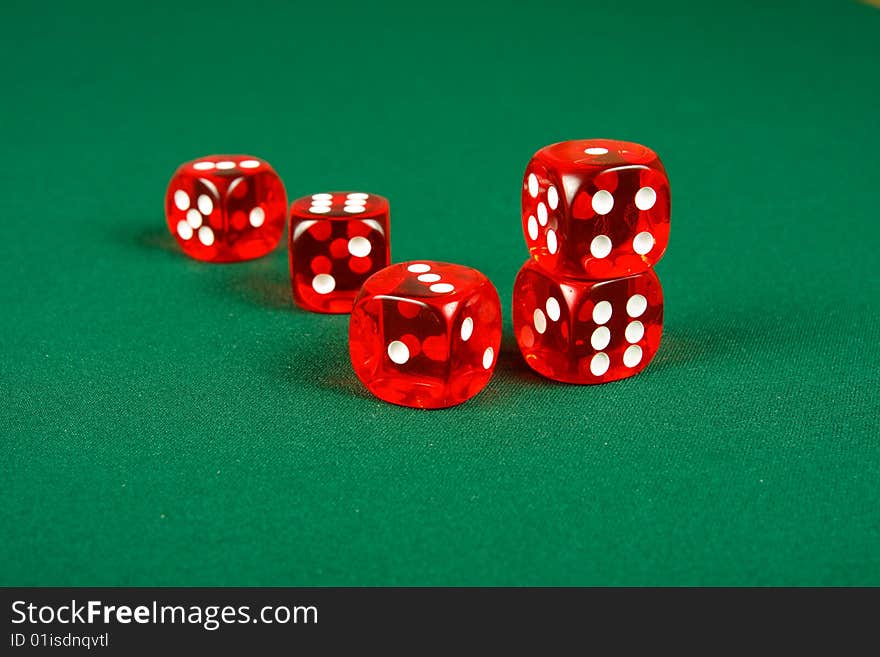 Red dice on casino table