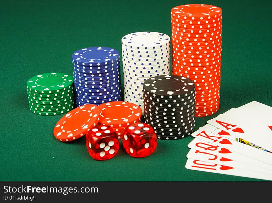 Chips ,dices and royal flush on casino table. Chips ,dices and royal flush on casino table