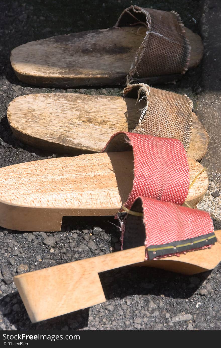 Old and well worn wooden clogs