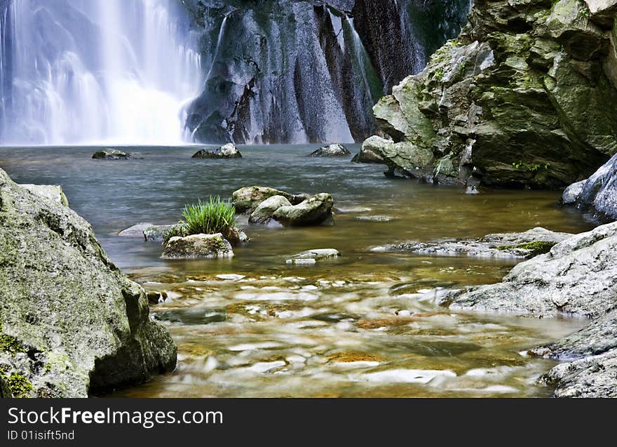 Waterfall in a river, nature and water. Waterfall in a river, nature and water