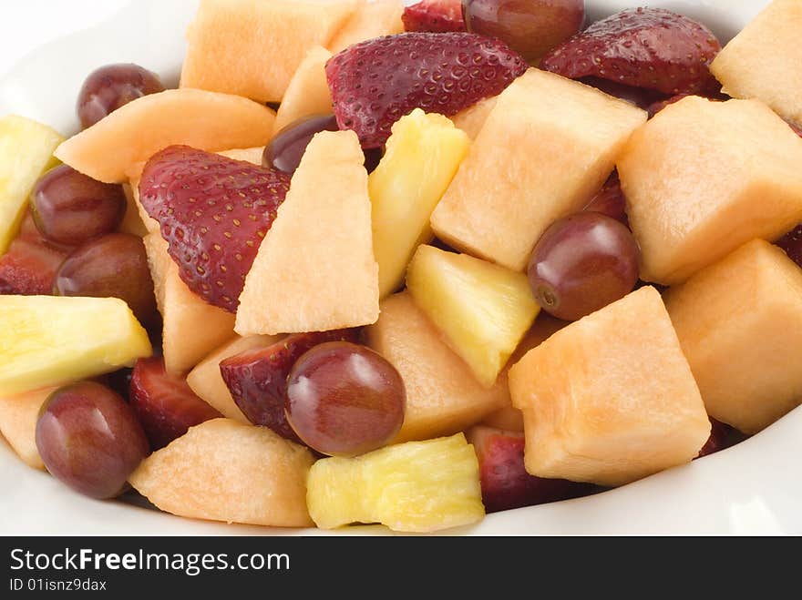 Closeup of cut mixed fresh fruit in bowl. Closeup of cut mixed fresh fruit in bowl