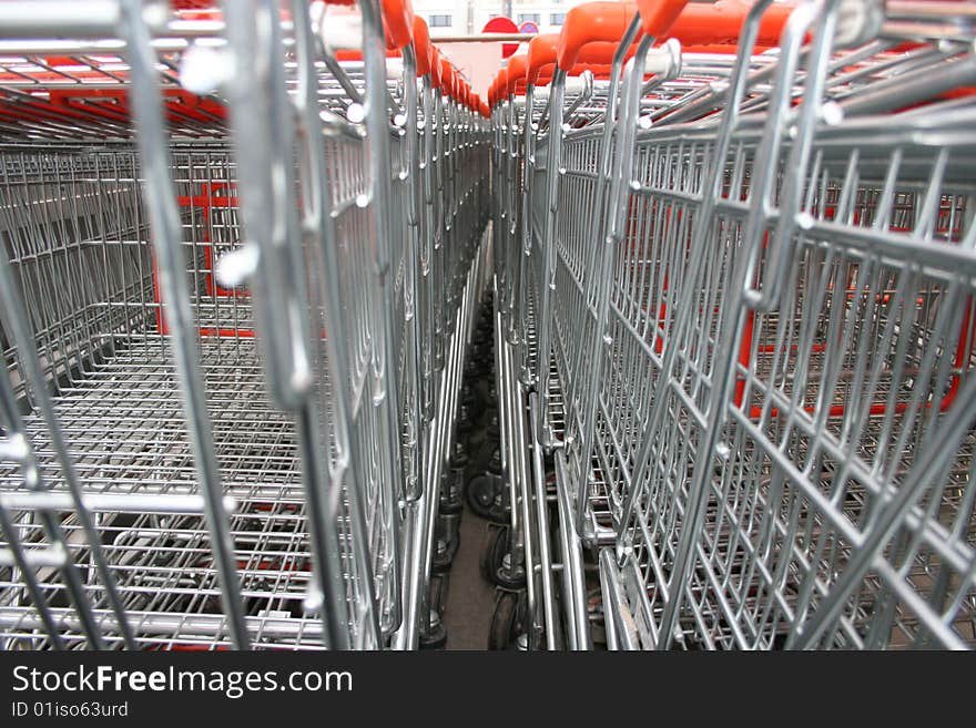 Detail of shopping cart infront of shop