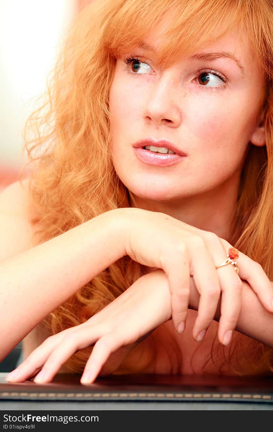 Portrait of the beautiful red-haired girl. Portrait of the beautiful red-haired girl