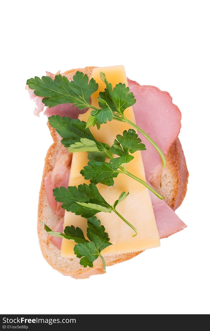 Open faced sandwich with ham, cheese and parsley isolated over white. Open faced sandwich with ham, cheese and parsley isolated over white