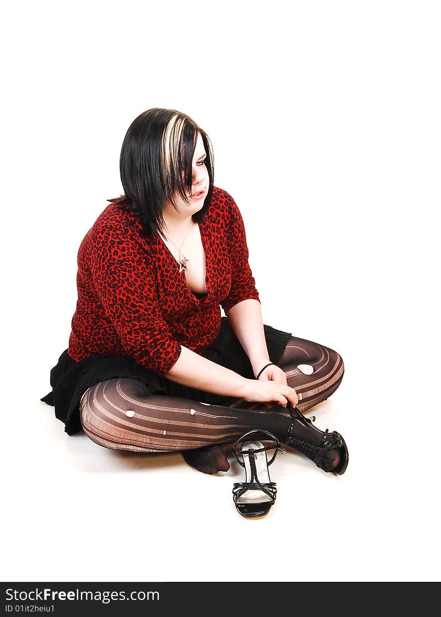 Girl Sitting On Floor.