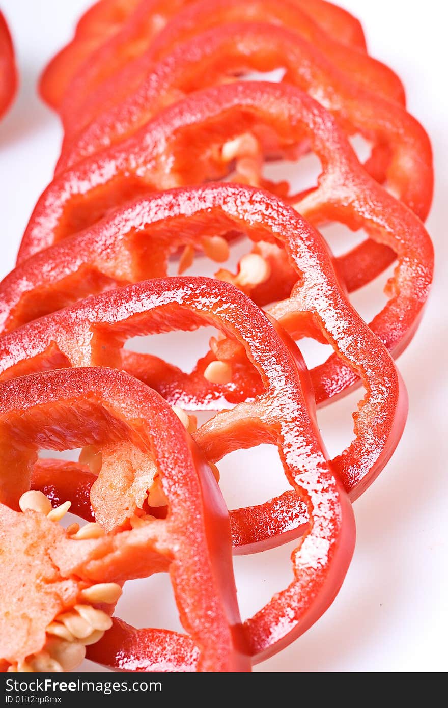 Sliced red pepper isolated on white