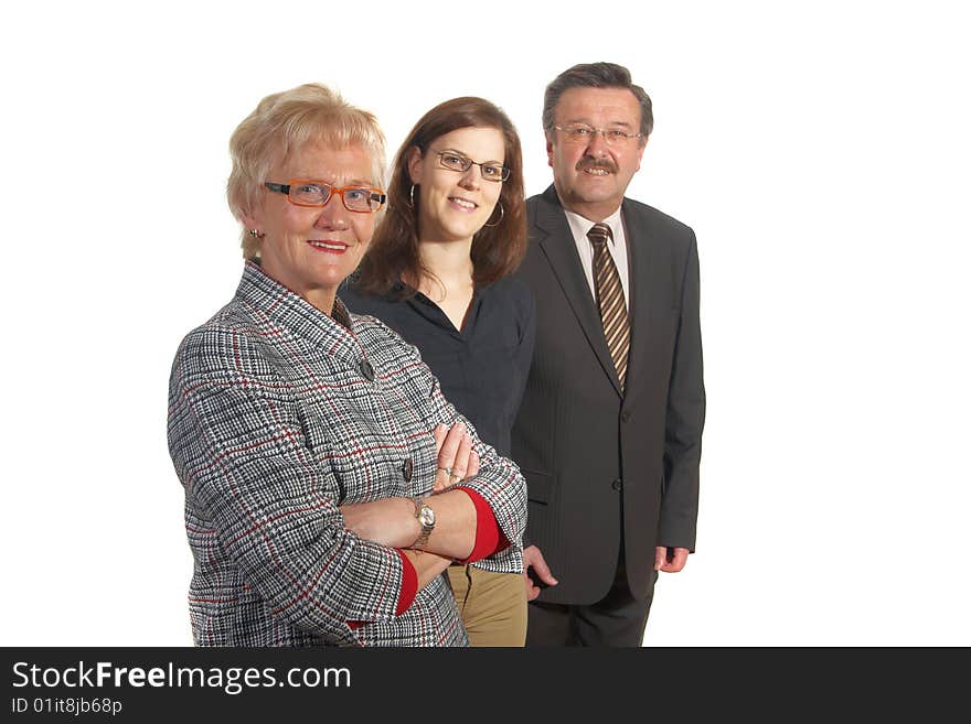 Senior business team with a young female worker. Senior business team with a young female worker.