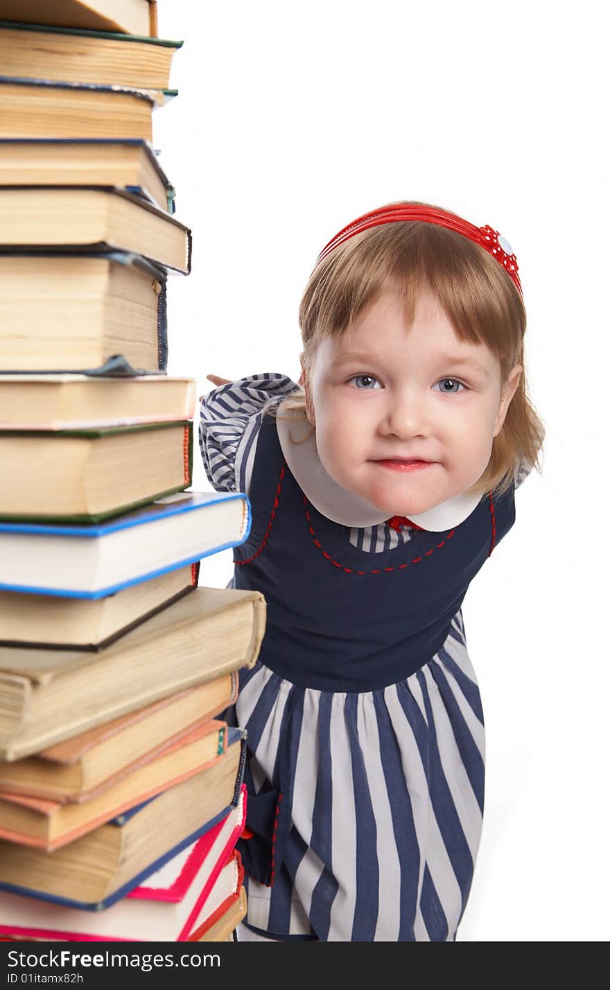 Little girl with book on white background