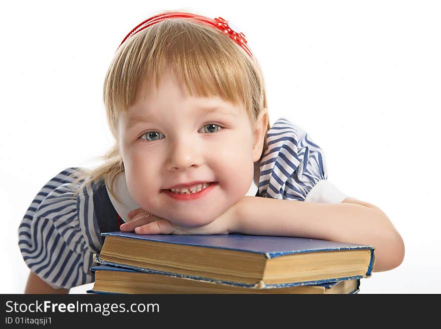 Little girl with book on white background