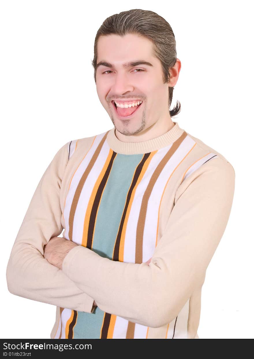 Young dark haired caucasian man in striped sweater making silly face and showing tongue isolated on white. Young dark haired caucasian man in striped sweater making silly face and showing tongue isolated on white