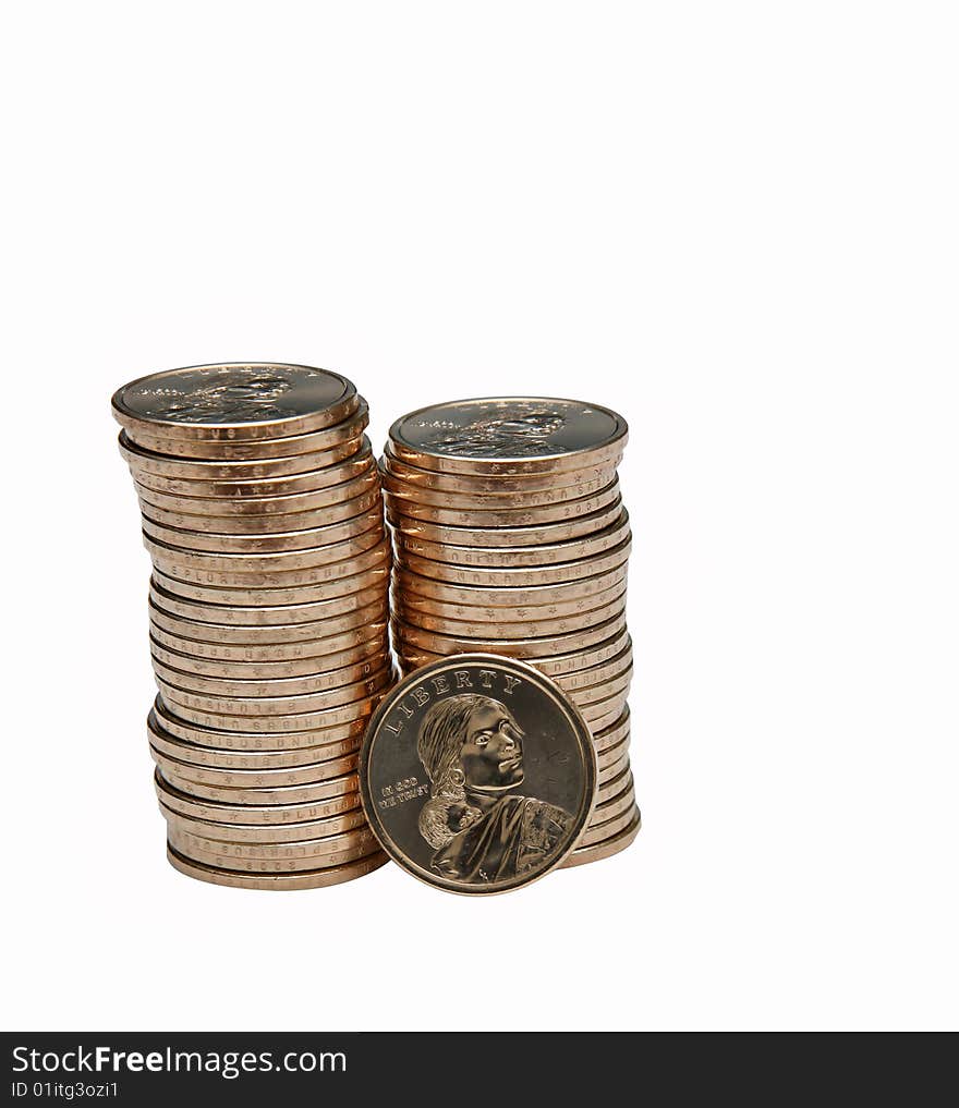 Stack of Coins with one coin turned heads forwards