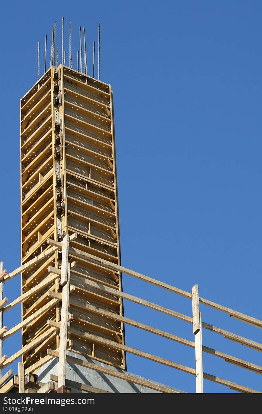 Wooden Scaffolding with Yellow Unfinished Metal Components