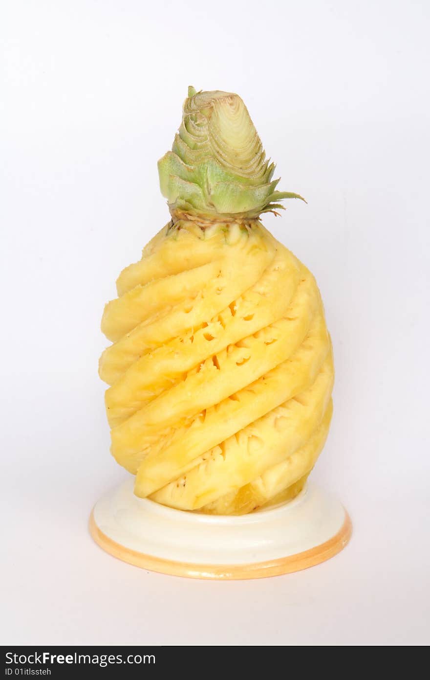 Whole peeled pineapple, a tropical fruit. Whole peeled pineapple, a tropical fruit