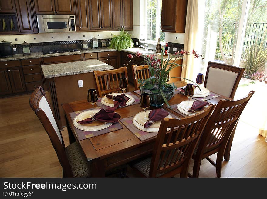 Dining Table And Kitchen.