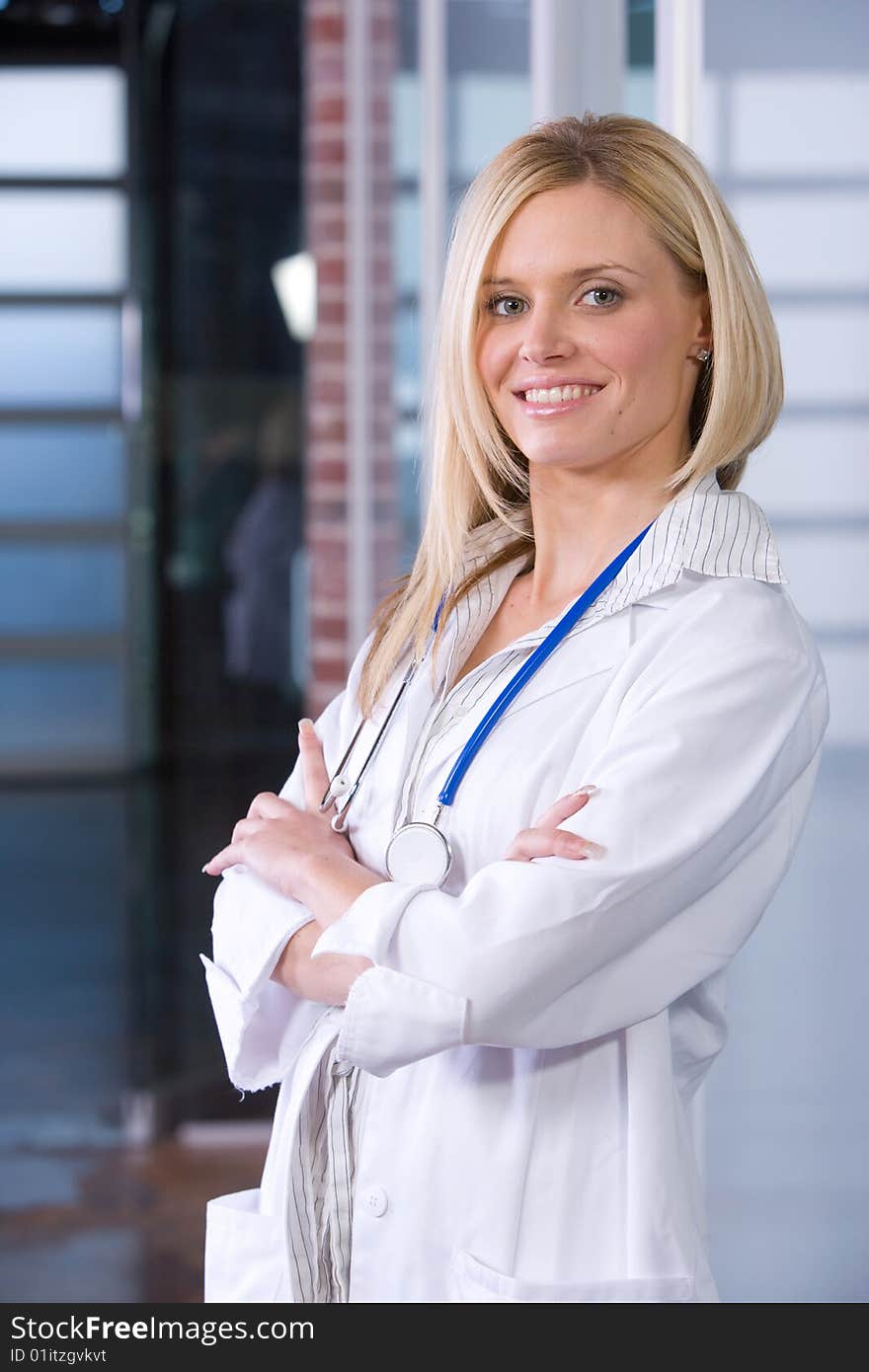 Young female doctor standing in a modern office