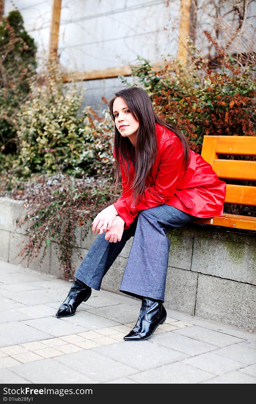 Portrait of a beautiful young woman in the city