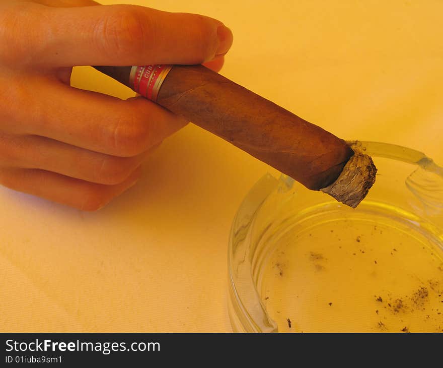 Large cuban cigar in a ashtray