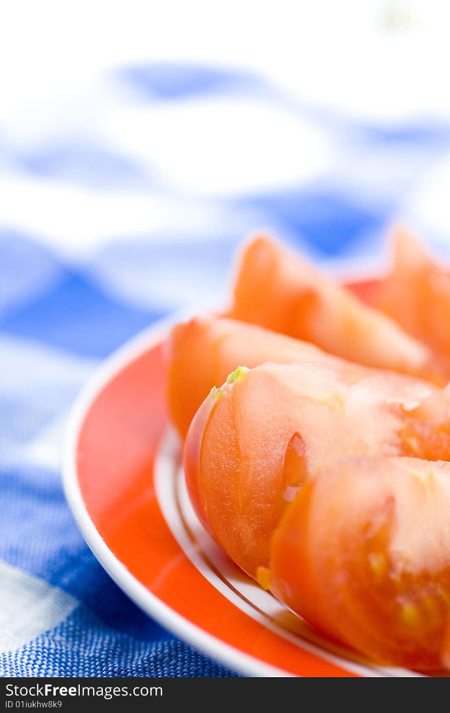 Fresh tomato on dinner table