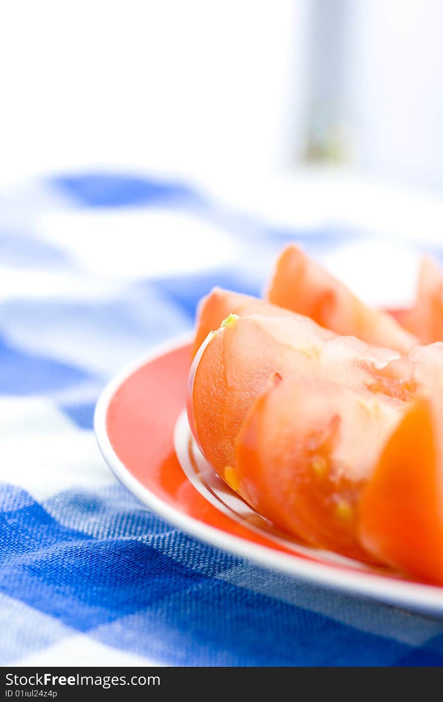 Fresh tomato on dinner table