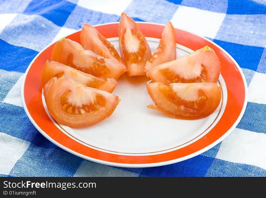 Fresh tomato on dinner table