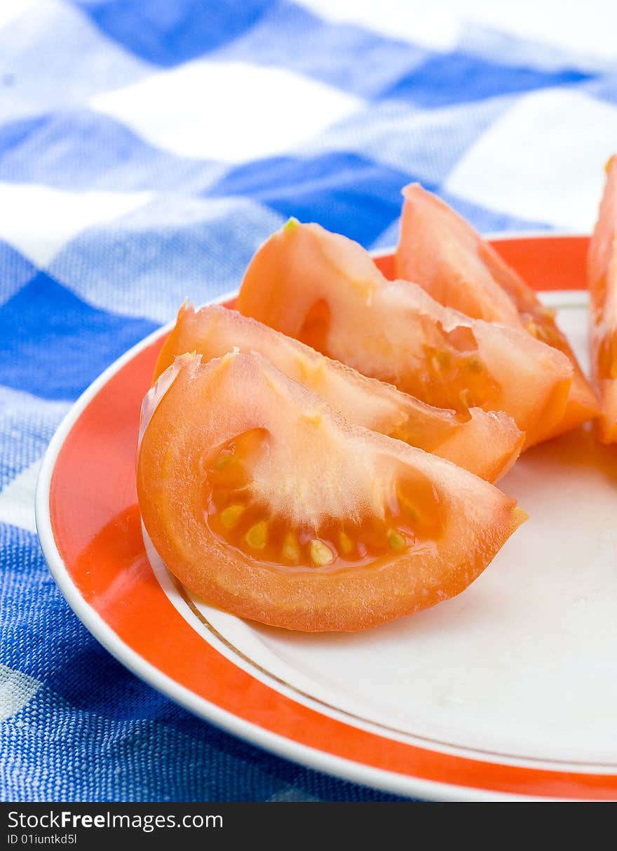 Fresh tomato on dinner table